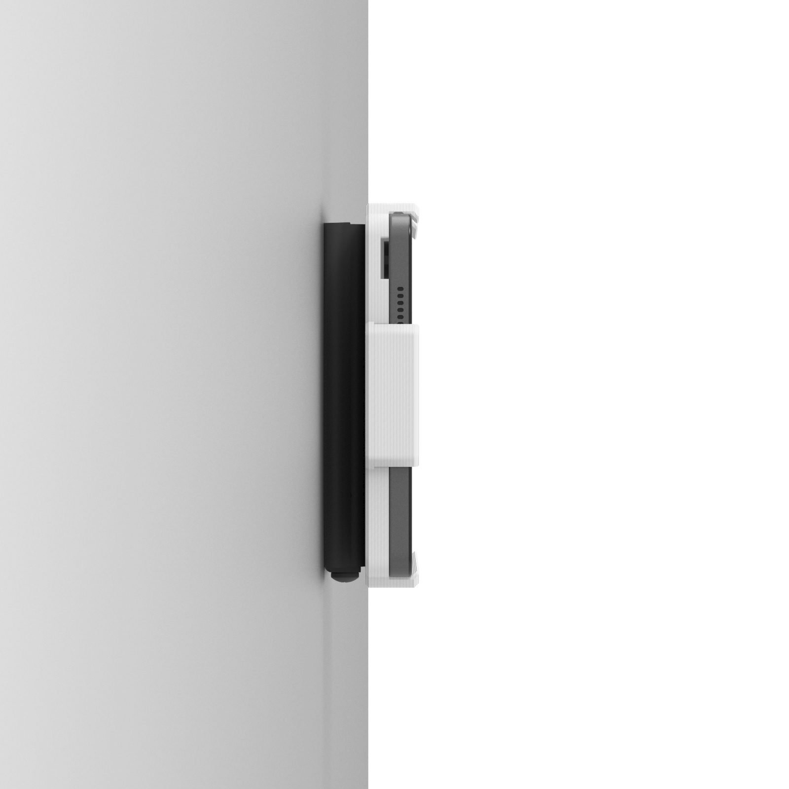 side view of a mounted tablet with a stylus attached to a vertical surface