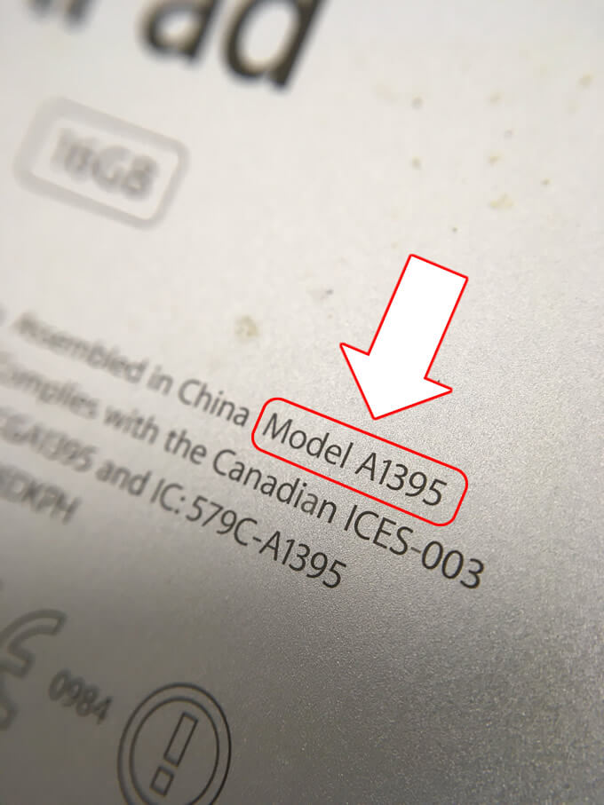 Close-up of inscription on the back of a device showing